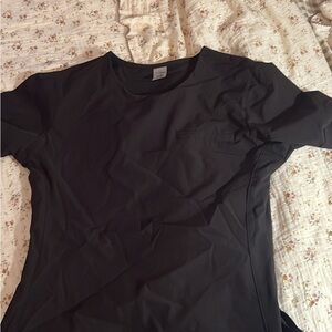 XS black C Saucy Scrub Top
Like new 
Anywhere collection top